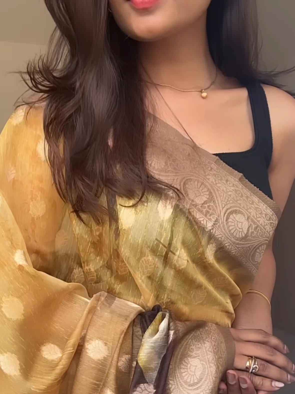 Yellow and black semi tissue saree