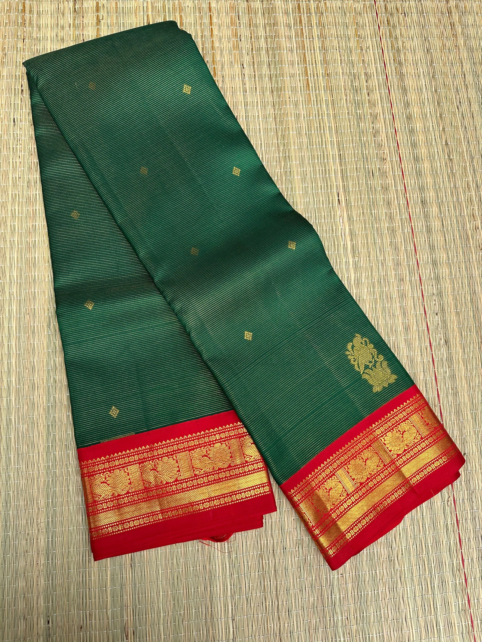 2G Zari pure Kanchipuram handloom silk saree in bottle green colour with red border